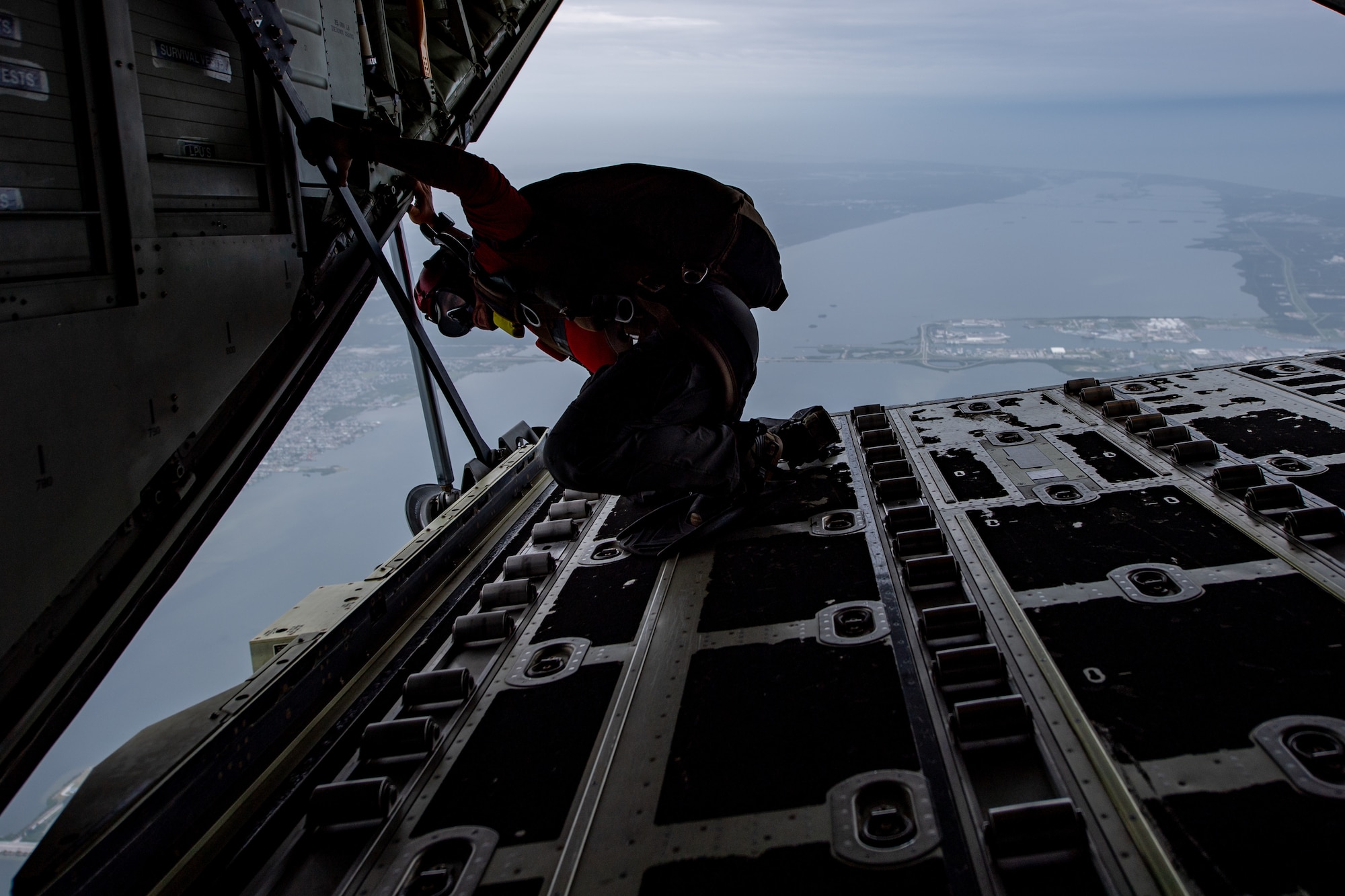 Photo of Airman on the ramp of an aircraft