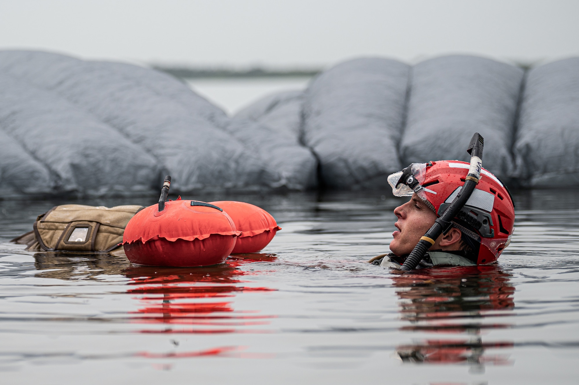 Photo of Airman swimming in water