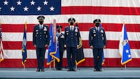 Air Force Chief of Staff Gen. CQ Brown, Jr., Gen. Timothy Ray, outgoing Air Force Global Strike Command commander, and Gen. Anthony Cotton, incoming AFGSC commander, stand at the position of attention during the AFGSC change of command ceremony at Barksdale Air Force Base, Louisiana, Aug. 27, 2021. The ceremony is a military tradition that represents a formal transfer of authority and responsibility for a unit from one commanding or flag officer to another. (U.S. Air Force photo by Senior Airman Jacob B. Wrightsman)