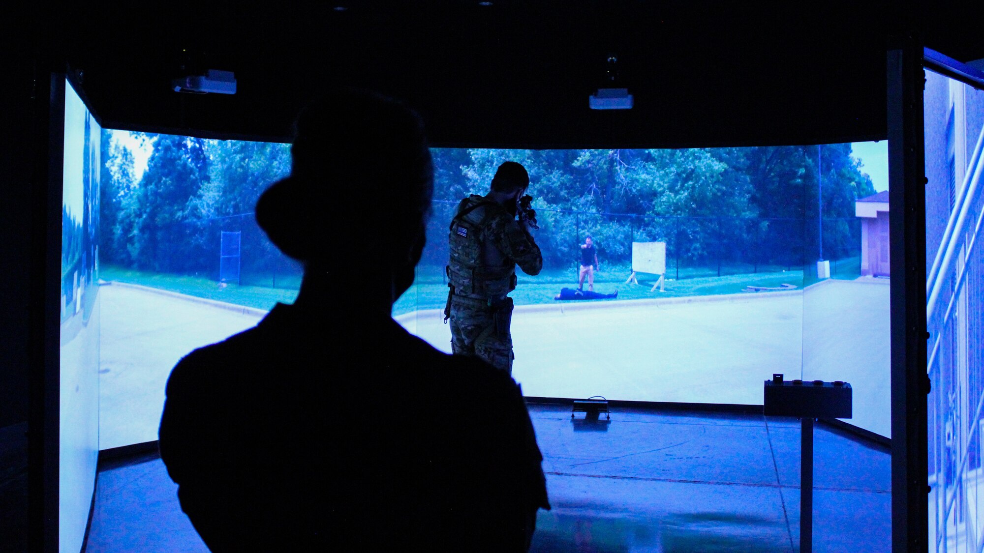 2nd Air Force Commander Maj. Gen. Michele C. Edmondson observes threat assessment simulator