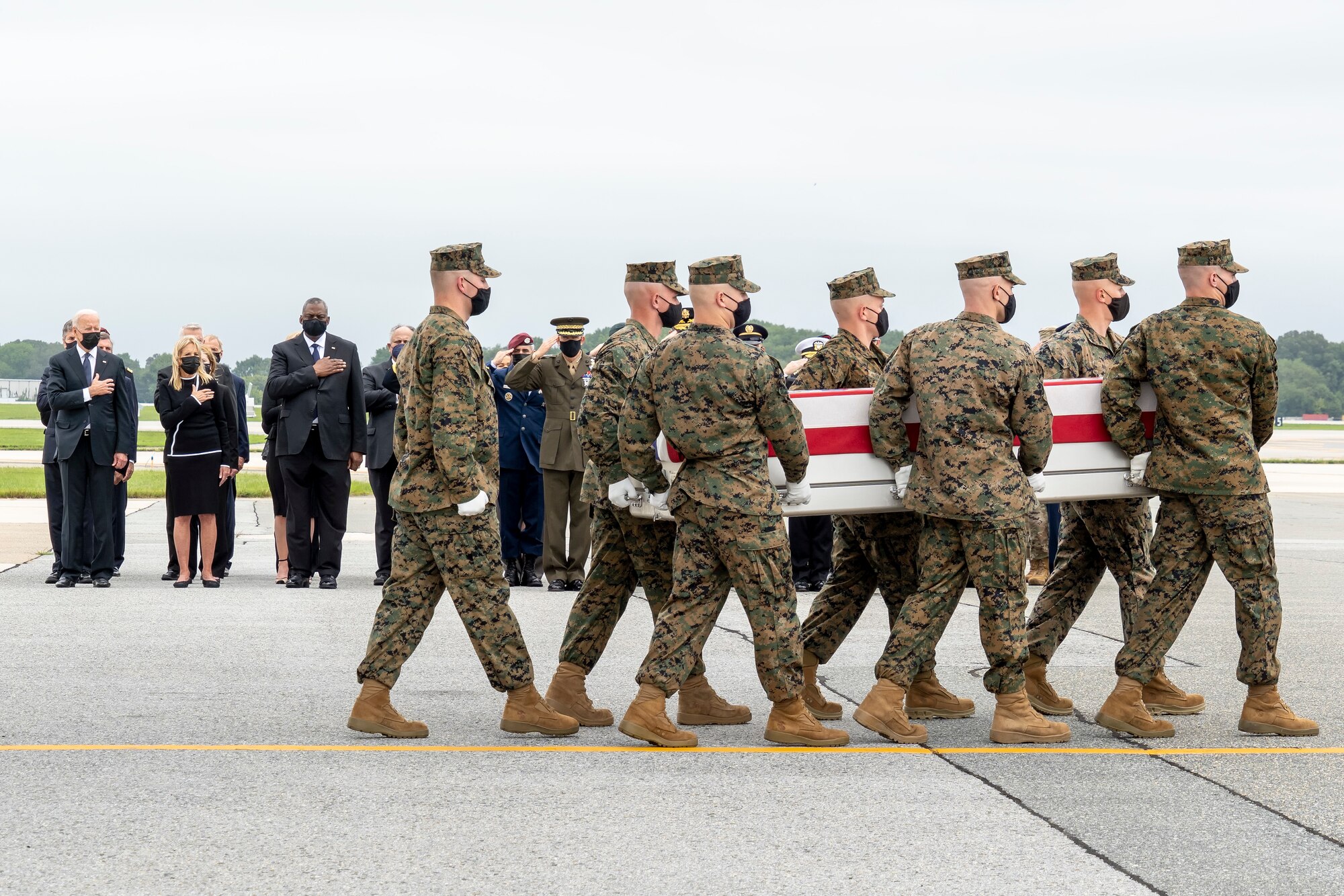 A U.S. Marine Corps carry team transfers the remains of Marine Corps Sgt. Johanny Rosariopichardo of Lawrence, Massachusetts, August 29, 2021 at Dover Air Force Base, Delaware. Rosariopichardo was assigned to 5th Marine Expeditionary Brigade, Naval Support Activity Bahrain. (U.S. Air Force photo by Jason Minto)