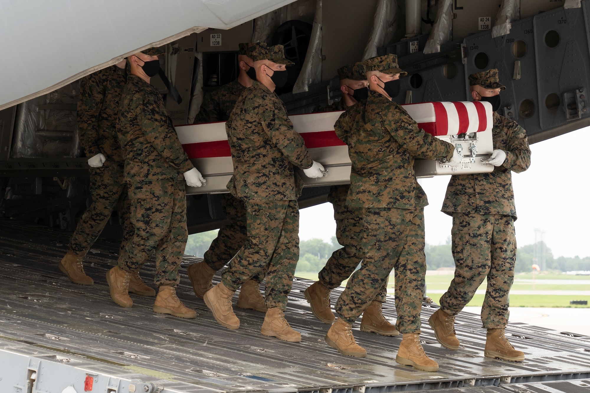 A U.S. Marine Corps carry team transfers the remains of Marine Corps Lance Cpl. Kareem M. Nikoui of Norco, California, Aug. 29, 2021 at Dover Air Force Base, Delaware. Nikoui was assigned to 2nd Battalion, 1st Marine Regiment, 1st Marine Division, I Marine Expeditionary Force, Camp Pendleton, California. (U.S. Air Force photo by Jason Minto)