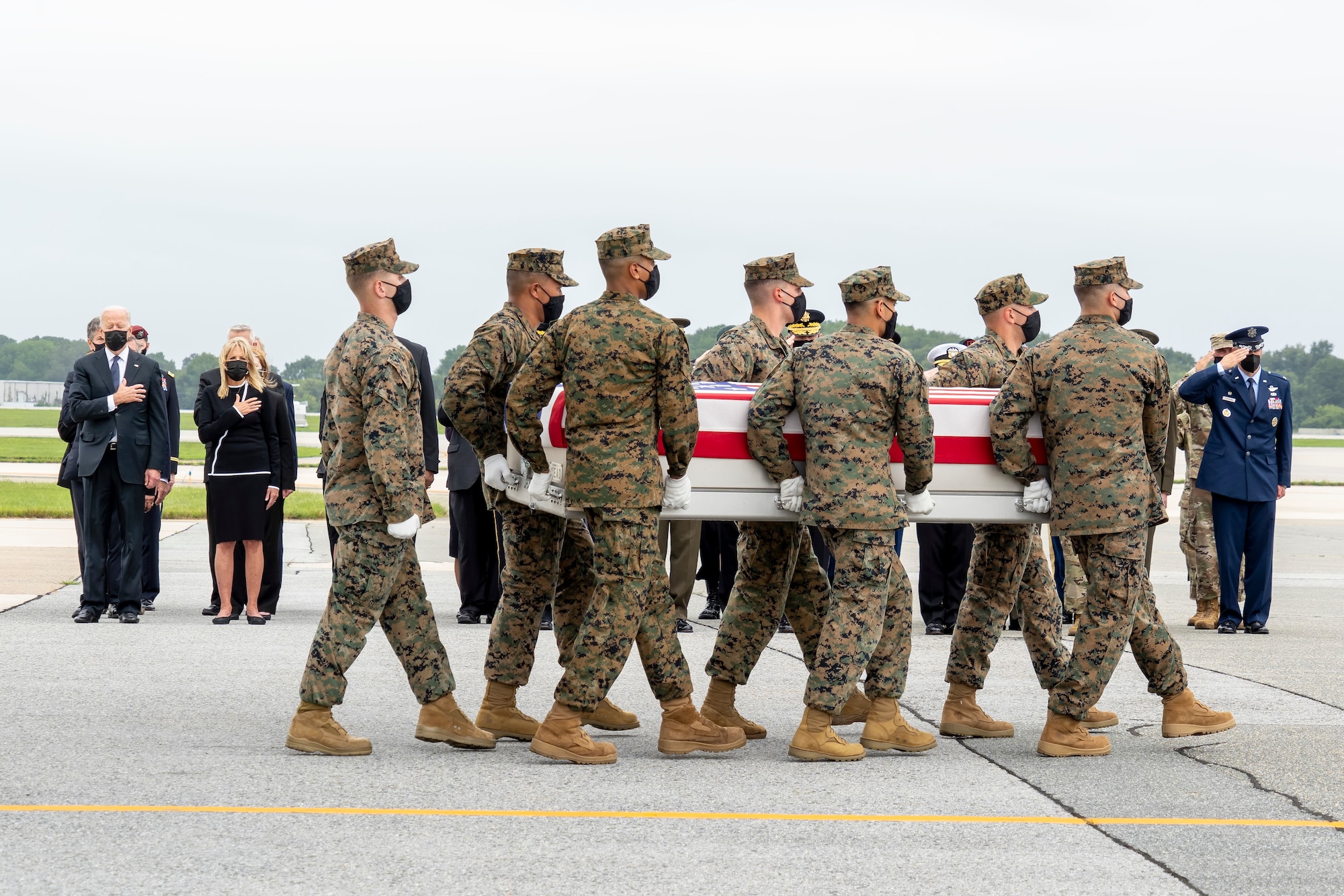 A U.S. Marine Corps carry team transfers the remains of Marine Corps Lance Cpl. Dylan R. Merola of Rancho Cucamonga, California, Aug. 29, 2021 at Dover Air Force Base, Delaware. Merola was assigned to 2nd Battalion, 1st Marine Regiment, 1st Marine Division, I Marine Expeditionary Force, Camp Pendleton, California. (U.S. Air Force photo by Jason Minto)