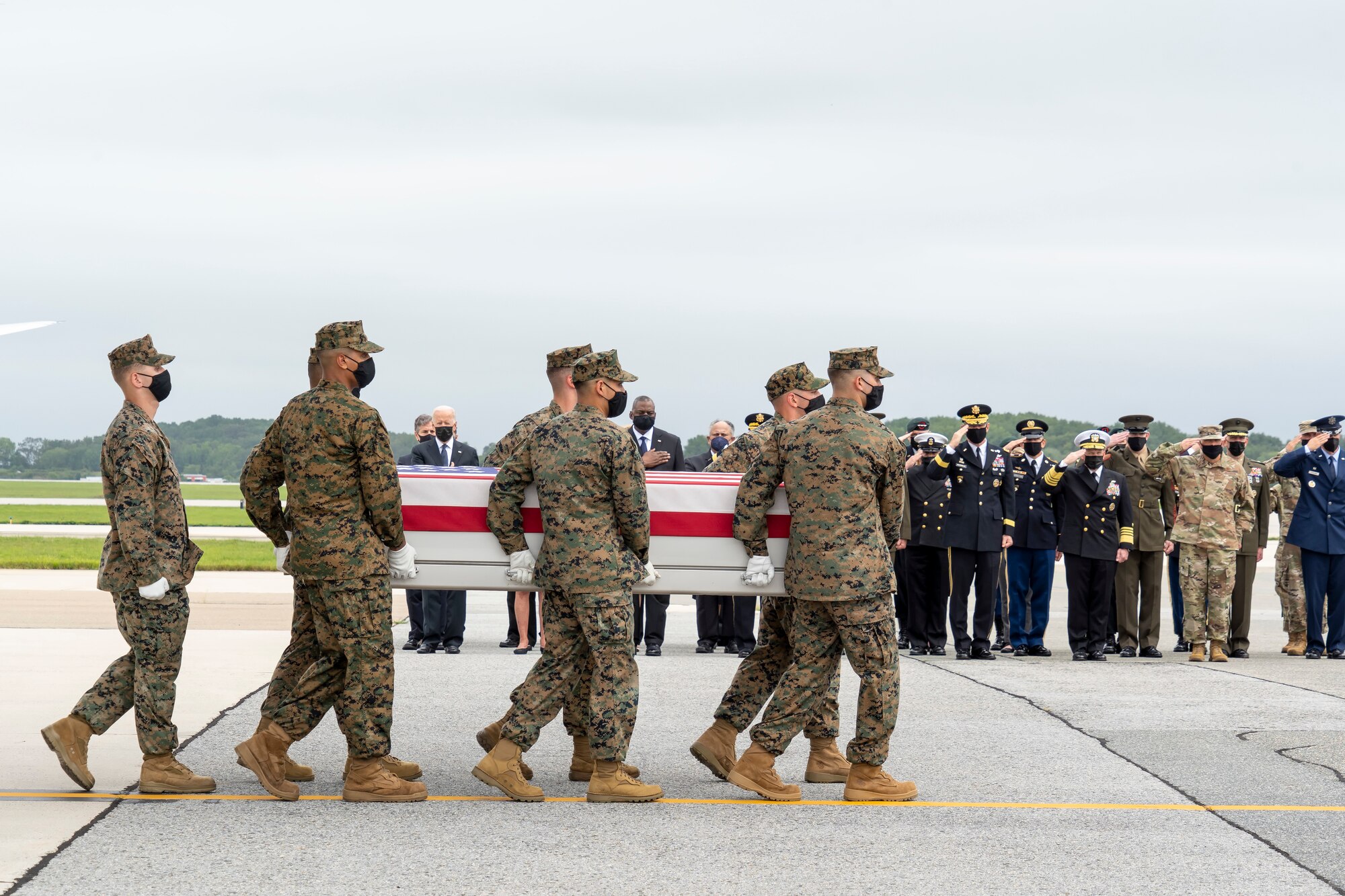 A U.S. Marine Corps carry team transfers the remains of Marine Corps Cpl. Humberto A. Sanchez of Logansport, Indiana, Aug. 29, 2021 at Dover Air Force Base, Delaware. Sanchez was assigned to 2nd Battalion, 1st Marine Regiment, 1st Marine Division, I Marine Expeditionary Force, Camp Pendleton, California. (U.S. Air Force photo by Jason Minto)