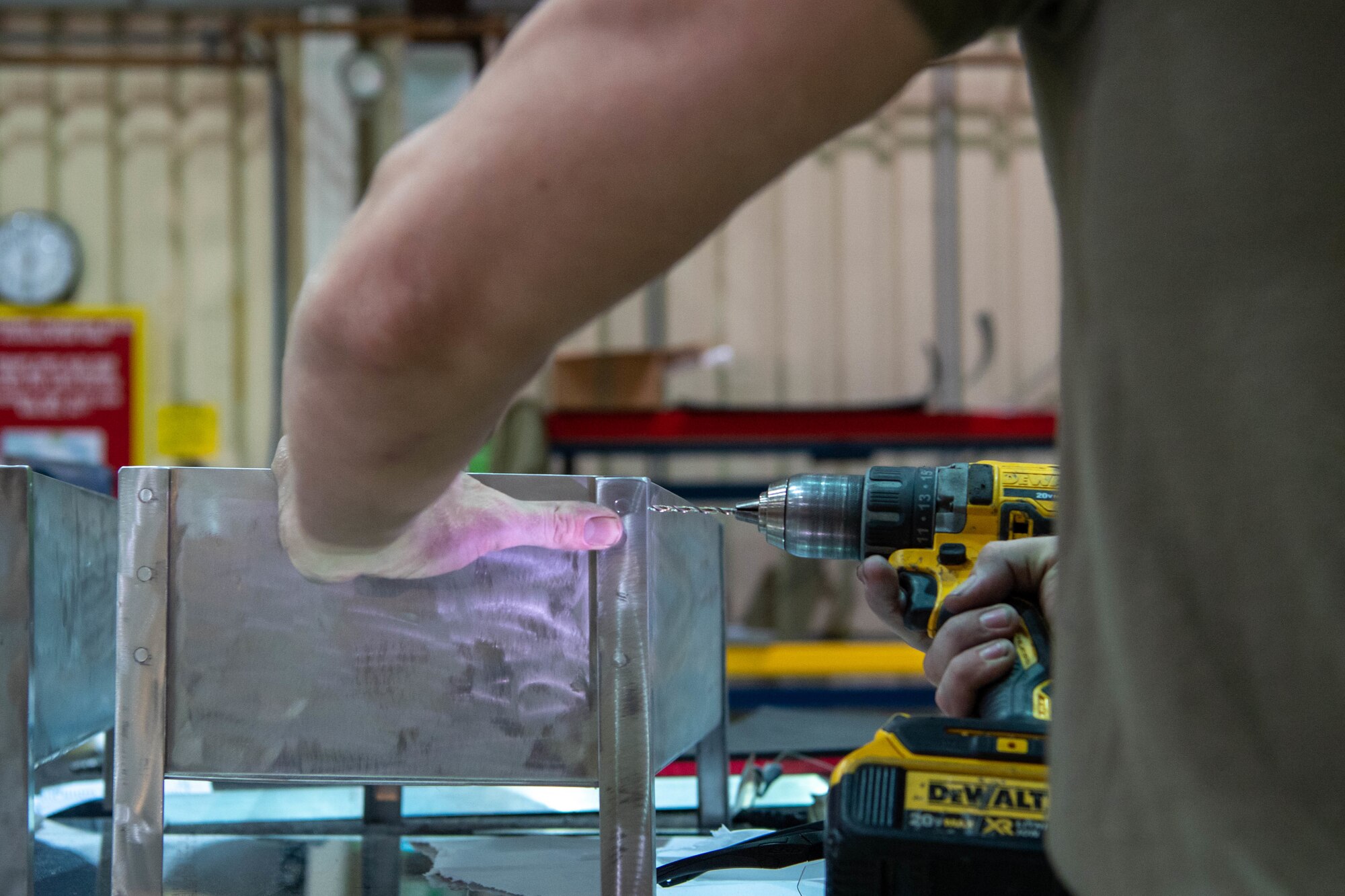 Airmen build pods.