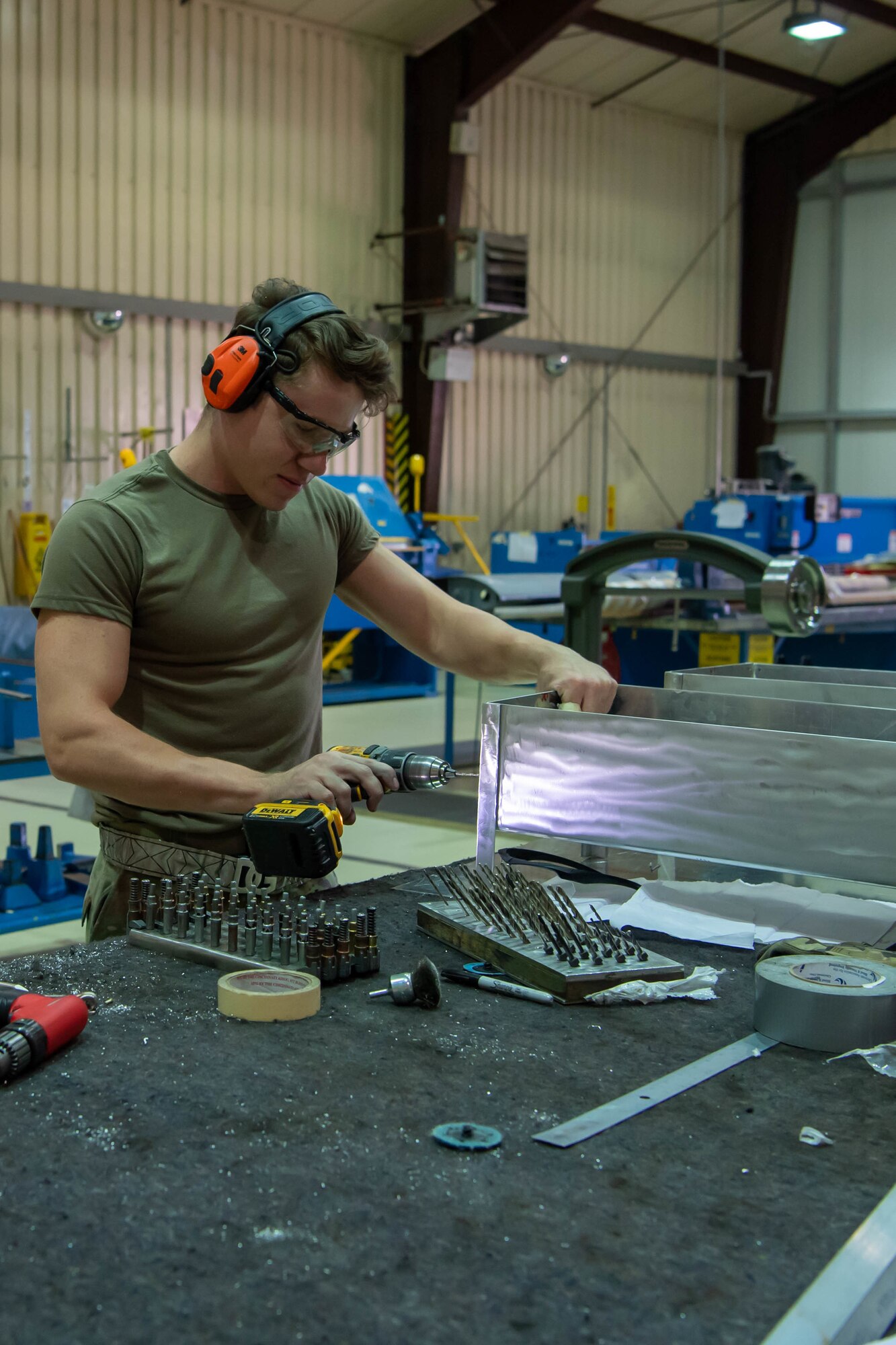 Airmen build pods.