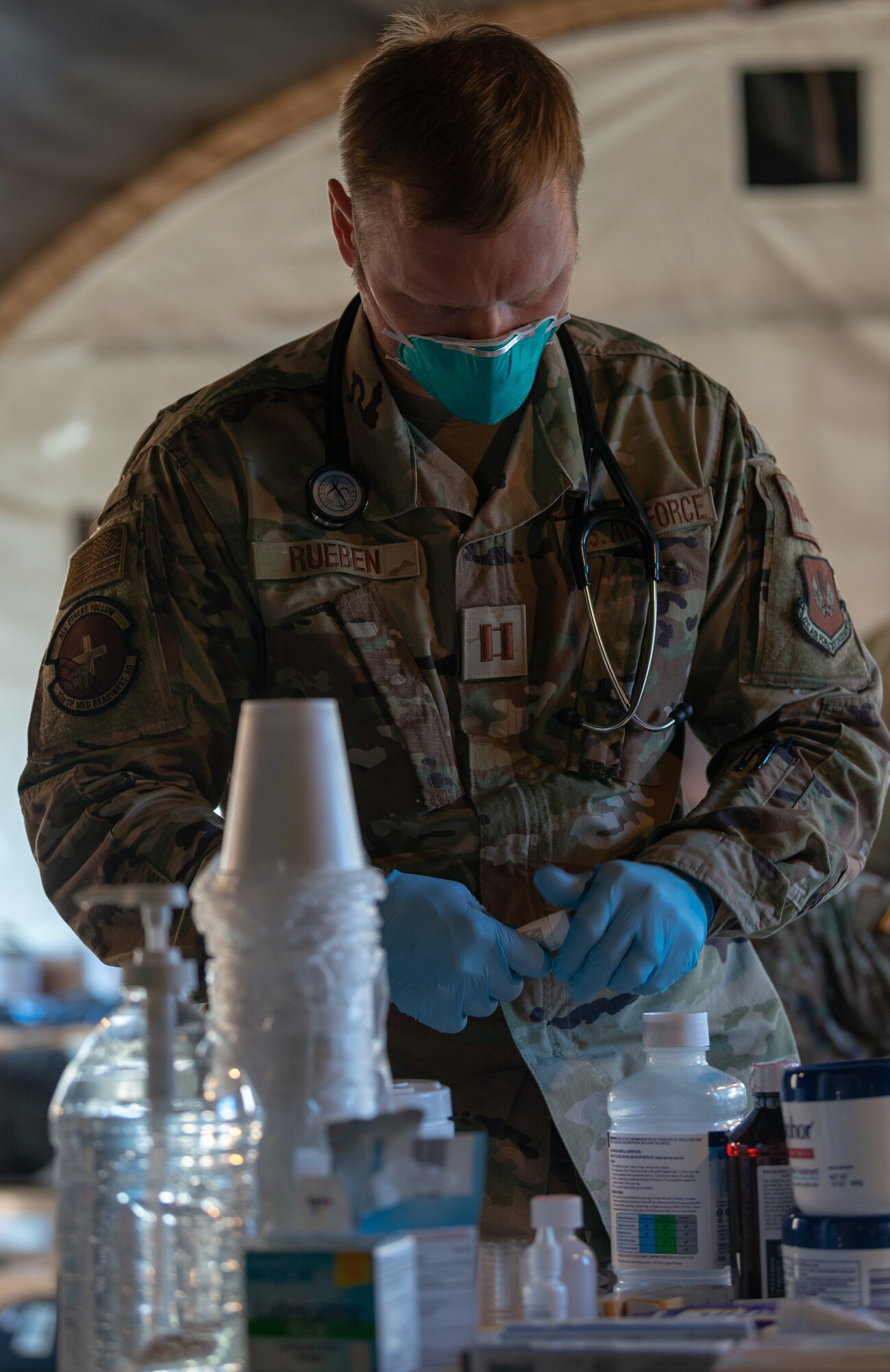 Airman provides medical care.
