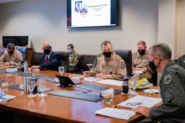 U.S. Air Force Lt. Gen. Gregory Guilllot, commander of 9th Air Force (Air Forces Central), briefs Gen. Mark Kelly, commander of Air Combat Command, at Shaw Air Force Base, South Carolina, August 13, 2021. The generals discussed future plans for Shaw, to include building resiliency of 9th Air Force (AFCENT) by increasing the number of Airmen who live and work here over the coming years. The first of these plans was realized this past spring with the repositioning of the ‘KINGPIN’ mission – and the more than 150 Airmen and coalition partners who support it - from the Middle East to Sumter.