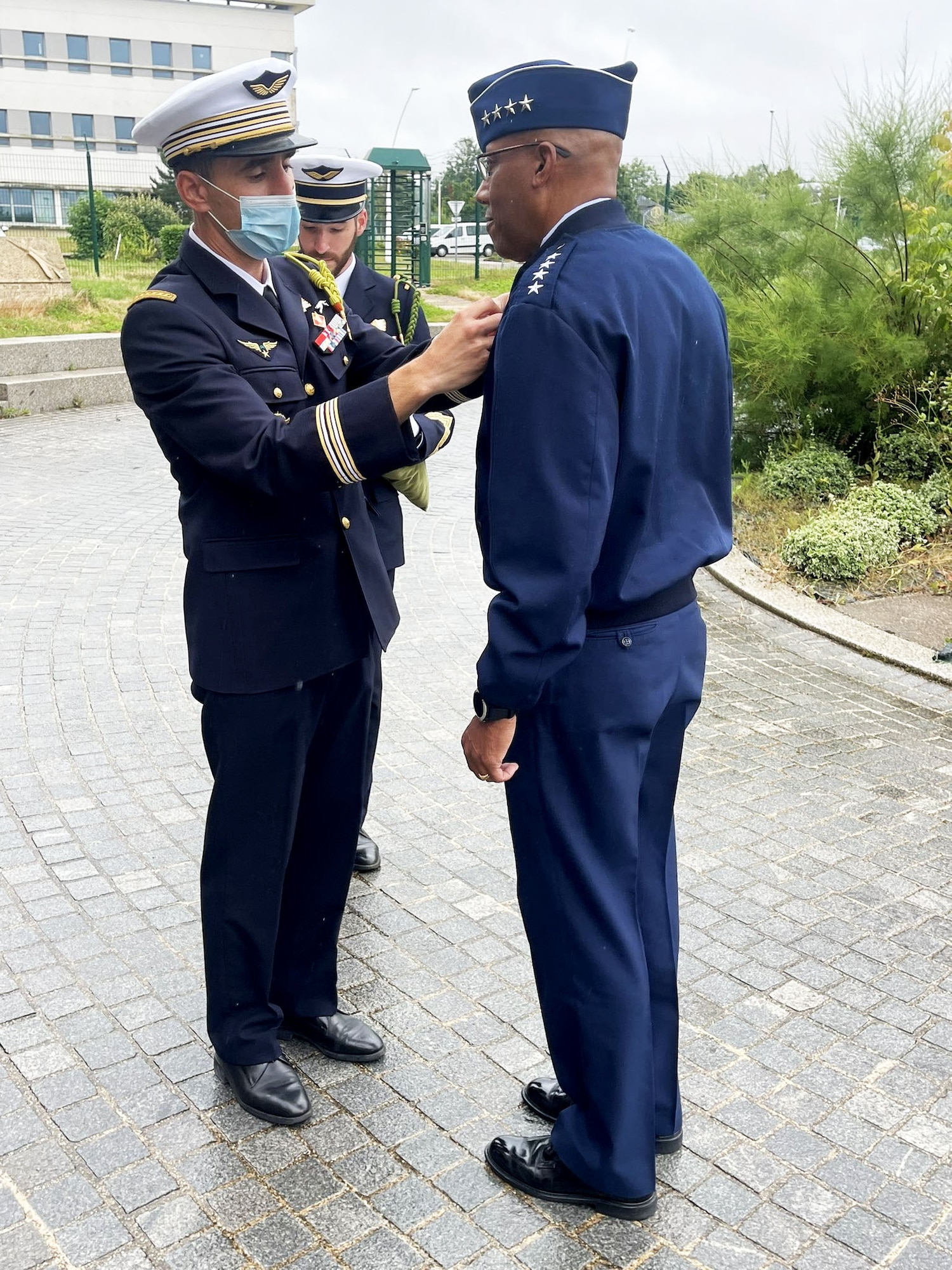 Air Force Chief of Staff Gen. CQ Brown, Jr. accepts a pin from the French Air and Space Force’s Fighter Squadron 2/4 Lafayette. (U.S. Air Force photo)