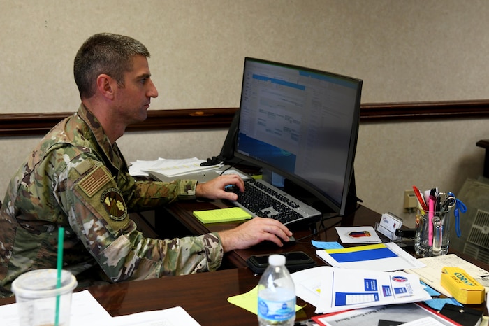 Airmen at desk