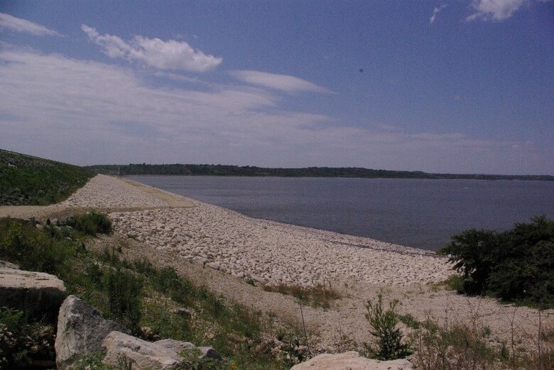 Upstream side of Tuttle Creek Dam east parking area looking west.   
Work is expected to begin on or about September 7, 2021 and will require closure of public access, including the east and west dam parking lots and the entire upstream face of the dam. These closures include all pedestrian and bank fishing.