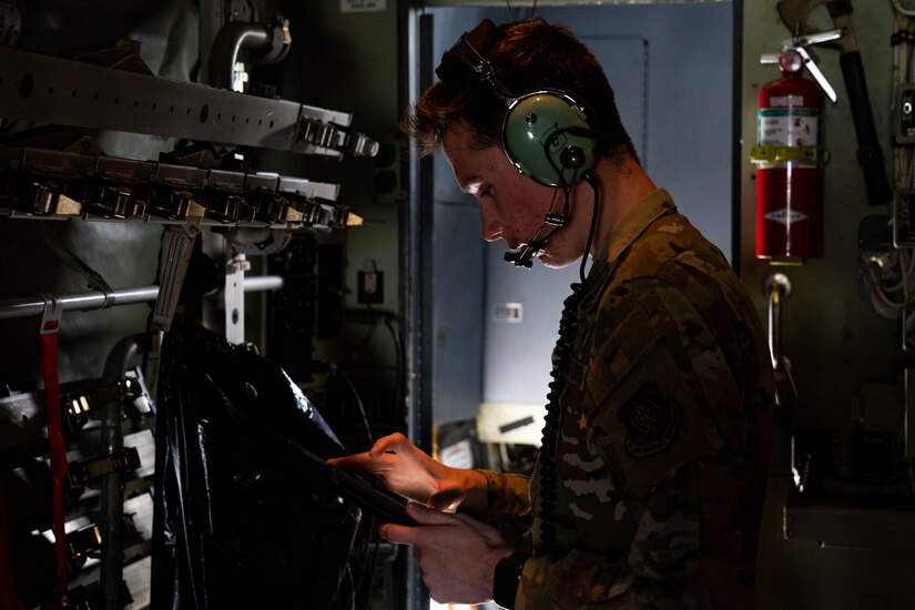 U.S. Air Force Airman 1st Class Andrew Harris, a 39th Airlift Squadron C-130J Super Hercules loadmaster from Dyess Air Force Base, Texas, conducts preflight checks during RED FLAG-Alaska 21-3.