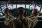U.S. Air Force Capt. Logan Collier, left, and 1st Lt. Emily Nole, right, 39th Airlift Squadron C-130J Super Hercules pilots from Dyess Air Force Base, Texas, pilot a C-130J as Staff Sgt. Nolan Brandt, center, a 39th Airlift Squadron C-130J Super Hercules instructor loadmaster from Dyess AFB, Texas, looks on during a RED FLAG-Alaska 21-3 sortie.