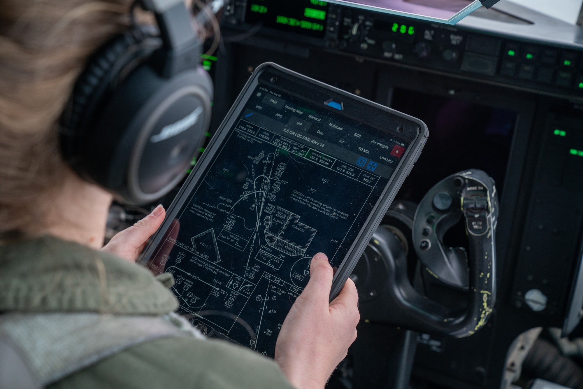 U.S. Air Force 1st Lt. Emily Nole, a 39th Airlift Squadron C-130J Super Hercules pilot from Dyess Air Force Base, Texas, reviews sortie details during a RED FLAG-Alaska 21-3 sortie.