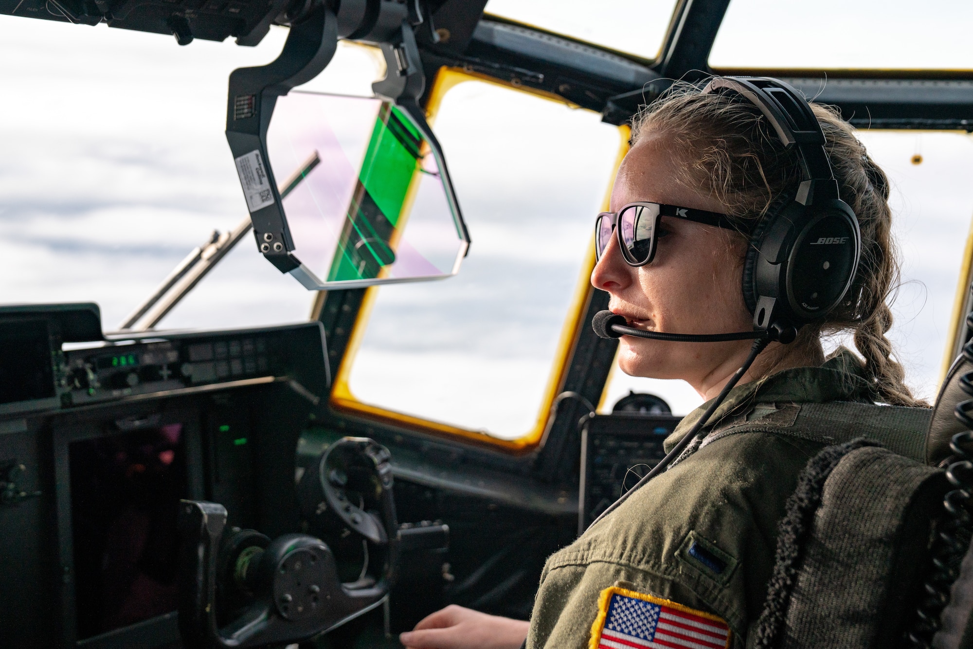 U.S. Air Force 1st Lt. Emily Nole, a 39th Airlift Squadron C-130J Super Hercules pilot from Dyess Air Force Base, Texas, talks to her team during a RED FLAG-Alaska 21-3 sortie.