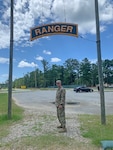 1st Lt. Edward Olbrych, a cyber security support platoon leader with the Virginia National Guard's 134th Cyber Security Company, 124th Cyber Protection Battalion, 91st Cyber Brigade, poses for a photo following his completion of the U.S. Army Ranger School in July 2021 at Fort Benning, Georgia. 
Olbrych mobilized with the 91st Cyber Brigade for the Task Force Echo mission and served as one of the lead Cyber subject matter experts on the team before completing the two-month long Ranger course and earning the right to wear the Ranger tab on his uniforms.