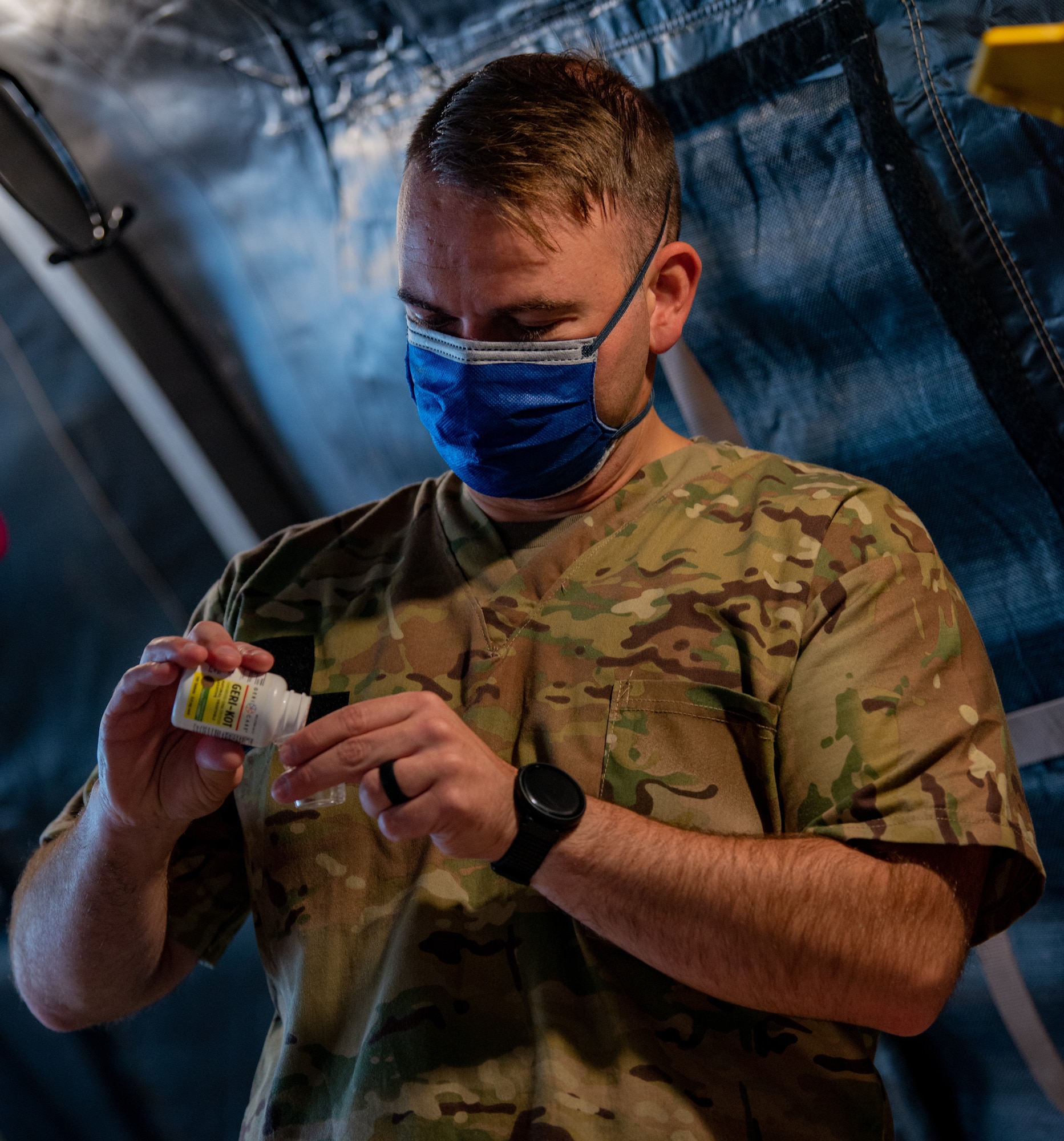 Soldier doses up medication.