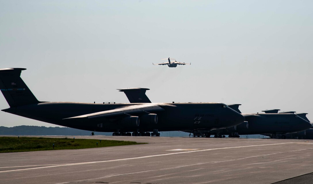 A C-17 Globemaster III takes off from Dover Air Force Base, Delaware, en route to support Afghanistan evacuation efforts, Aug. 24, 2021. Team Dover members donated infant formula, blankets and clothing in support of the safe evacuation of U.S. citizens, Special Immigrant Visa applicants and other vulnerable Afghans. (U.S. Air Force photo by Senior Airman Stephani Barge)