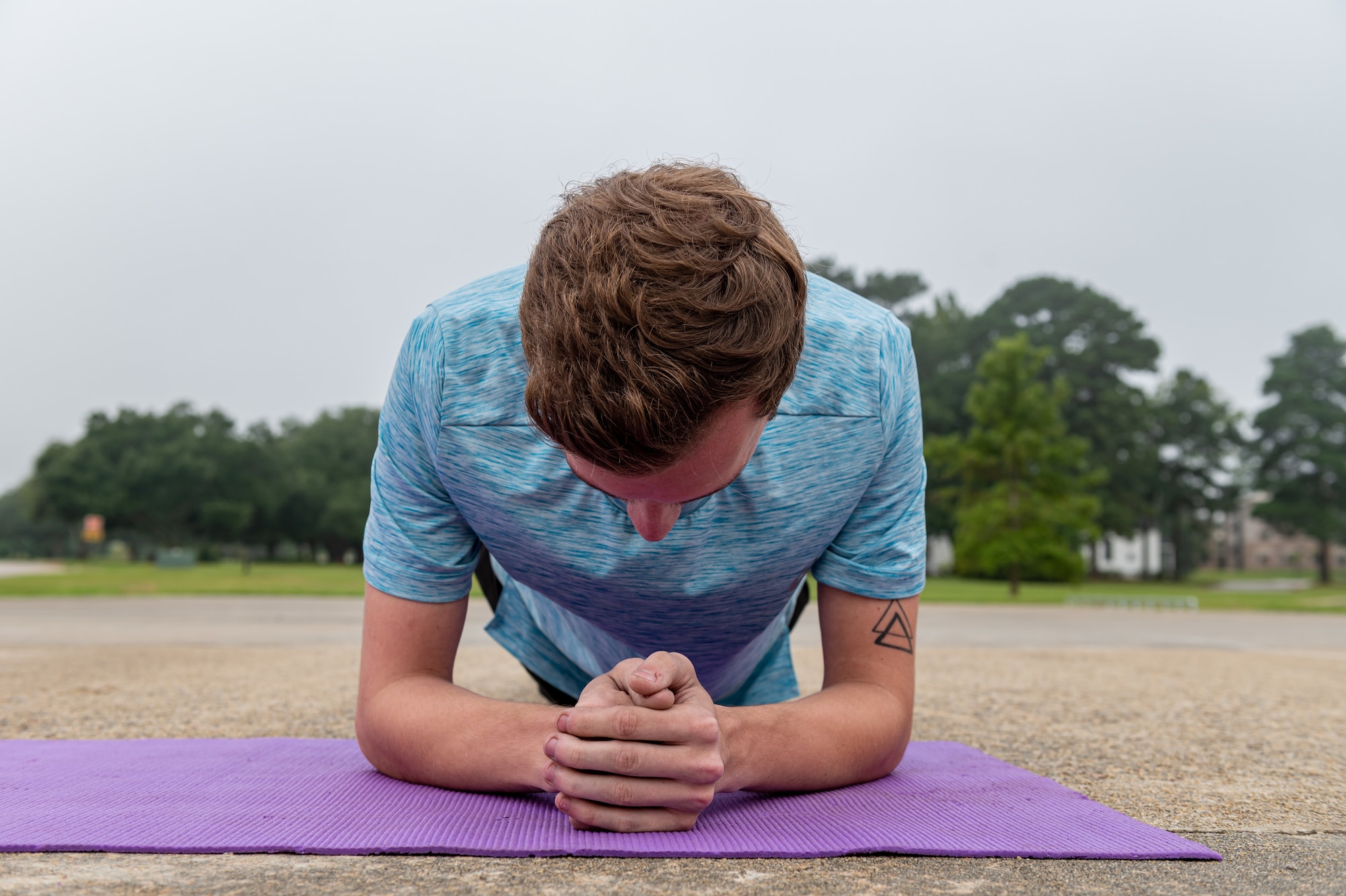 A photo of an Airman planking