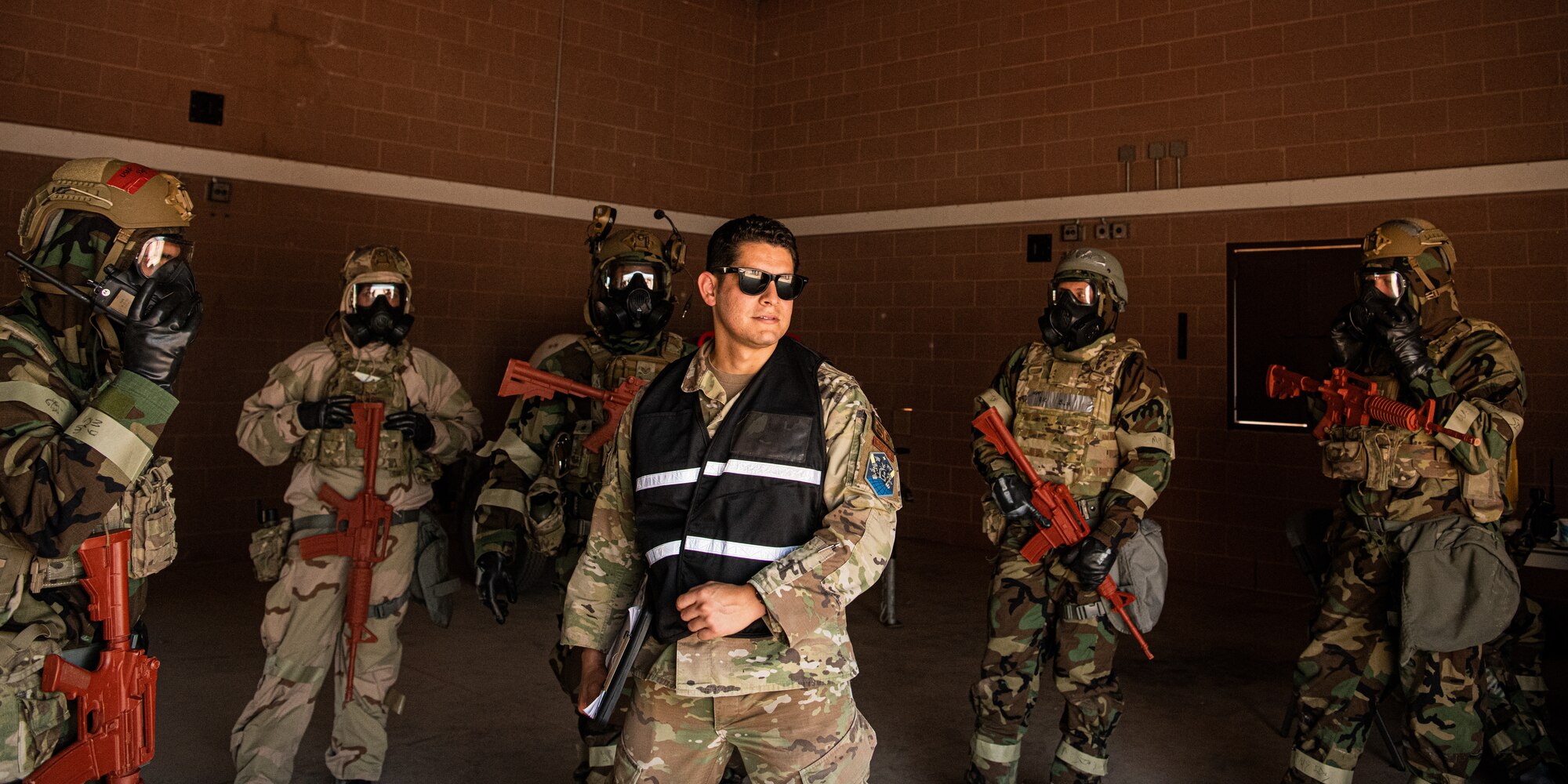 Peterson-Schriever Garrison Security Forces members receive an evaluation on how they performed during an exercise at Fort Carson, Colorado, Aug. 18, 2021. The exercise is for P-S GAR deployment coded individuals to increase their CBRN capabilities, ensuring they are prepared for deployment. (U.S. Space Force photo by Airman 1st Class Joshua Fontenot)