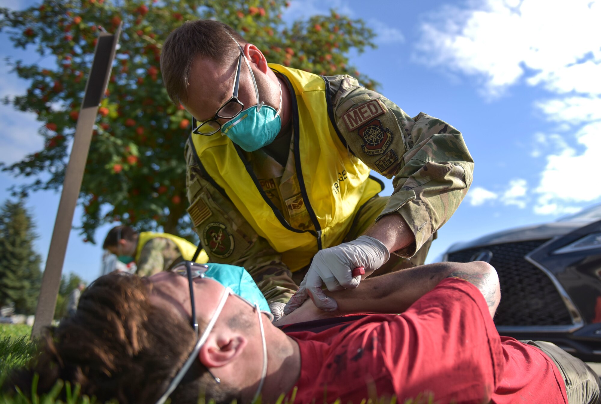 U.S. Air Force Staff Sgt. Donald Davenport, 92nd Operational Medical Readiness Squadron medical technician, treats a simulated patient during Exercise Ready Eagle at Fairchild Air Force Base, Washington, Aug. 27, 2021.