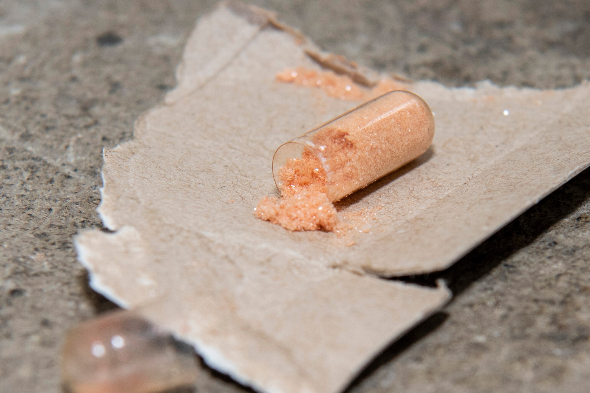 o-Chlorobenzylidene malononitrile (CS) tablets create non-lethal CS gas for a Chemical, Biological, Radiological and Nuclear defense station at Joint Base Elmendorf-Richardson, Alaska, Aug. 26, 2021. Soldiers assigned to the 4th Infantry Brigade Combat Team (Airborne), 25th Infantry Division, U.S. Army Alaska, completed various stations for a best squad competition. (U.S. Air Force photo by Senior Airman Emily Farnsworth)