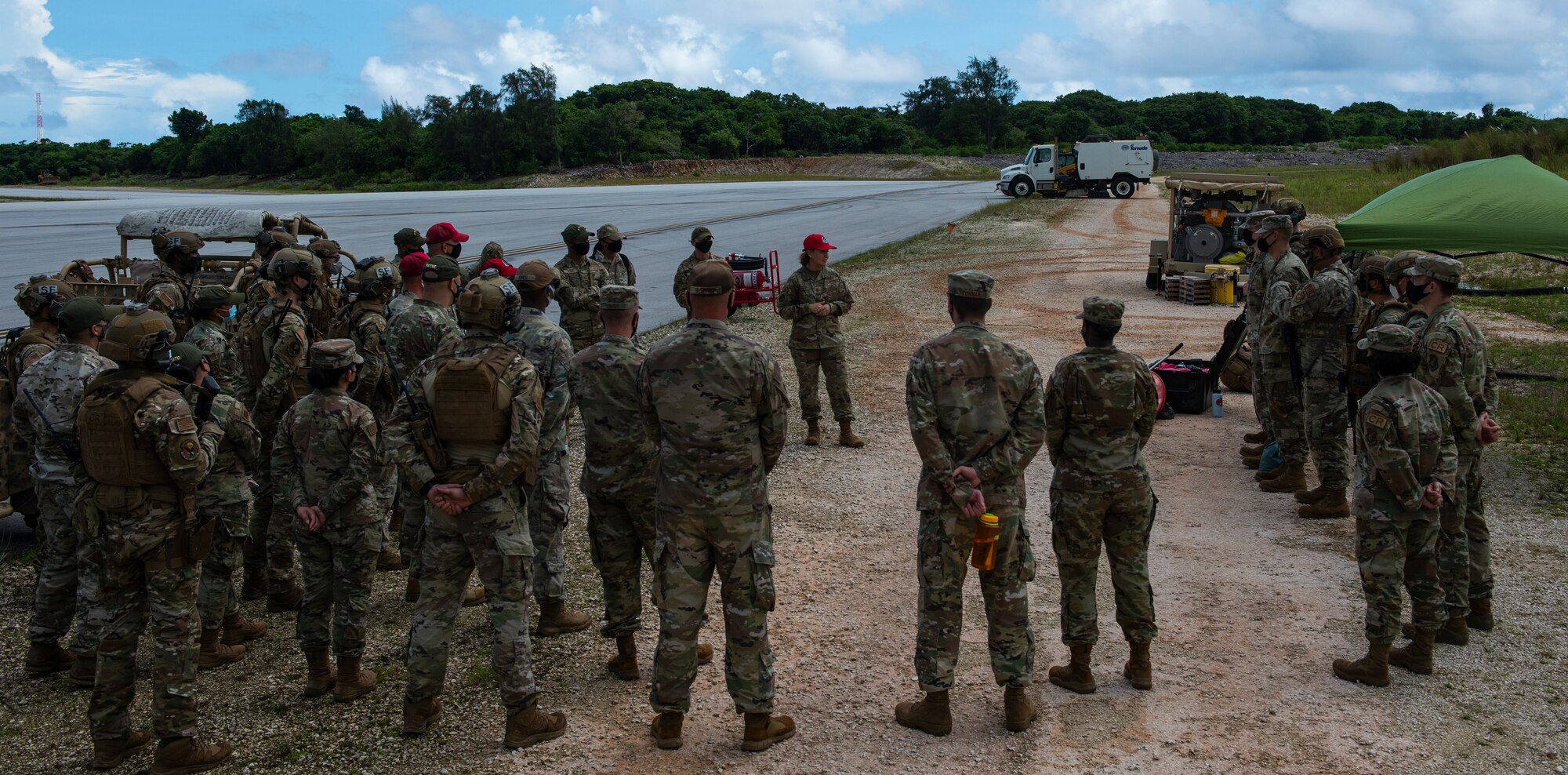 Chief Master Sergeant of the Air Force JoAnne S. Bass talks with Airmen assigned to the 36th Contingency Response Group at North West Field, Guam, Aug. 27, 2021.