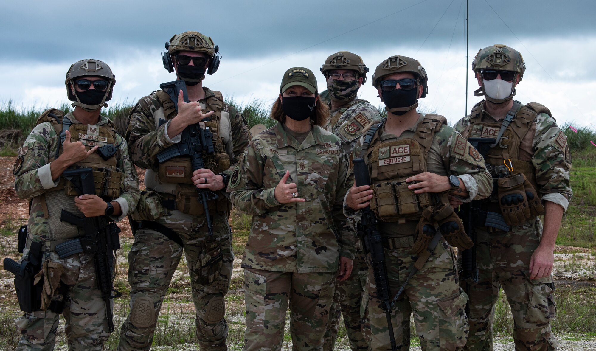 Chief Master Sergeant of the Air Force JoAnne S. Bass talks poses with Airmen assigned to 36th Contingency Response Group’s Agile Combat Employment Team at North West Field, Guam, Aug. 27, 2021.