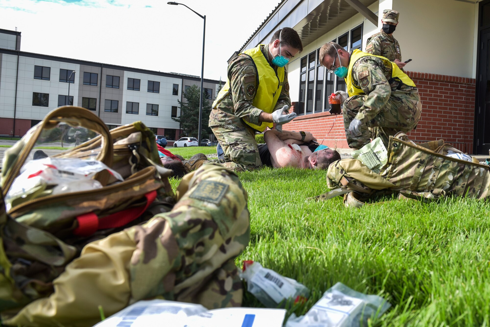 Members of the 92nd Medical Group perform triage on a simulated patient during Exercise Ready Eagle at Fairchild Air Force Base, Washington, Aug. 27, 2021.