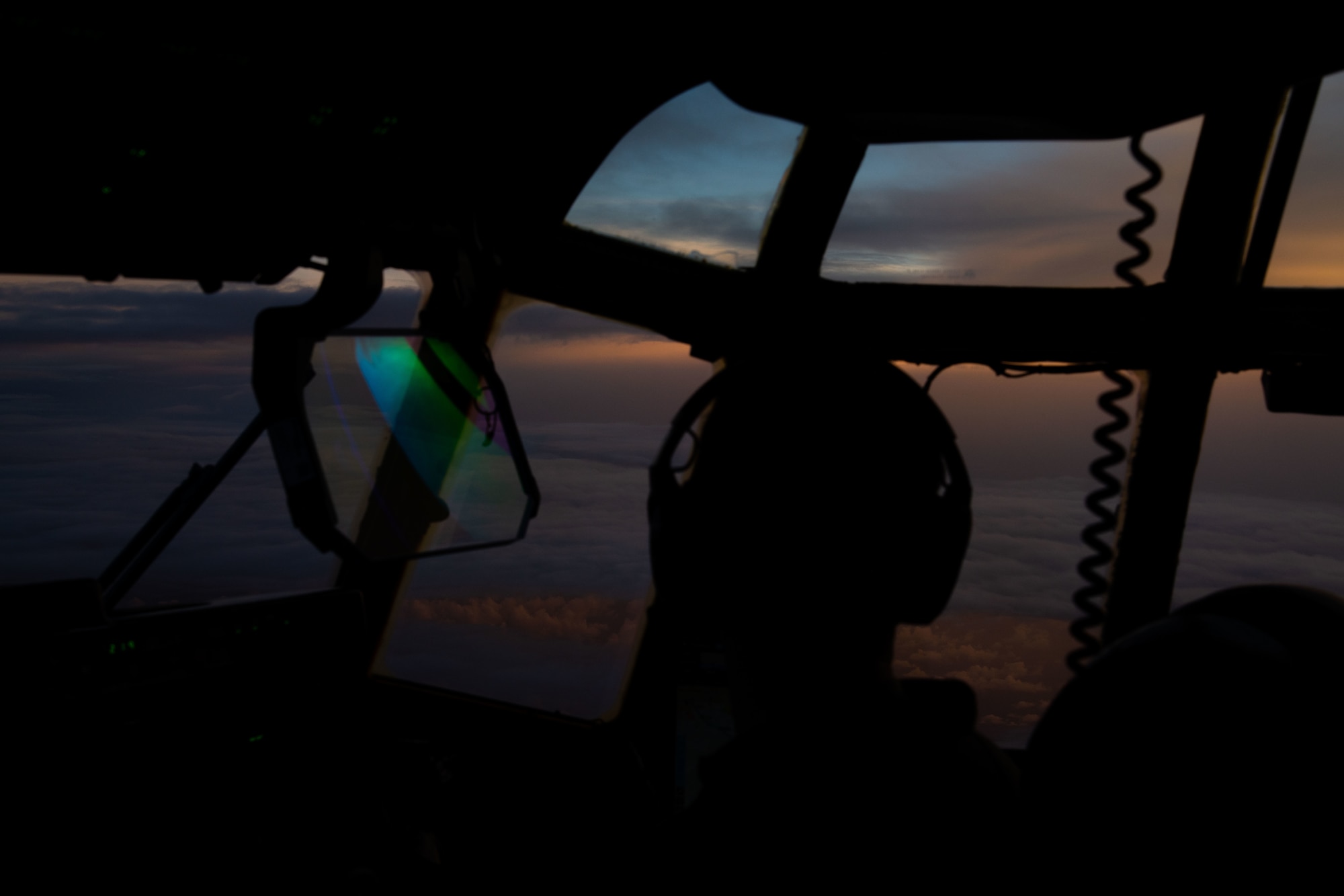 1st Lt. Tim Viere, pilot for the 53rd Weather Reconnaissance Squadron at Keesler Air Force Base, Miss., steers a WC-130J toward Hurricane Ida off the coast of Cuba Aug. 27, 2021. The flight left from Keesler and recovered in San Antonio in order to avoid forecasted impacts from the storm as well as continue to support the data collection mission of the 53rd. (U.S. Air Force photo by Staff Sgt. Kristen Pittman)
