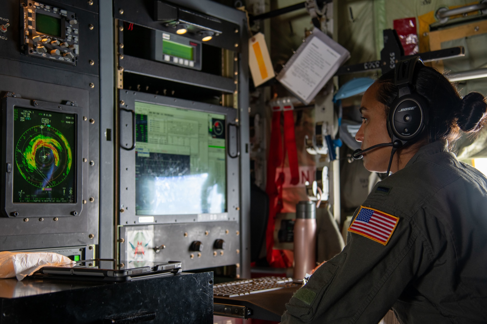 1st Lt. Amaryllis Cotto, 53rd Weather Reconnaissance Squadron aerial reconnaissance weather officer, monitors data collected in Hurricane Ida Aug. 29, 2021. Hurricane Ida made landfall as a category 4 hurricane in Louisiana. (U.S. Air Force photo by Staff Sgt. Kristen Pittman)
