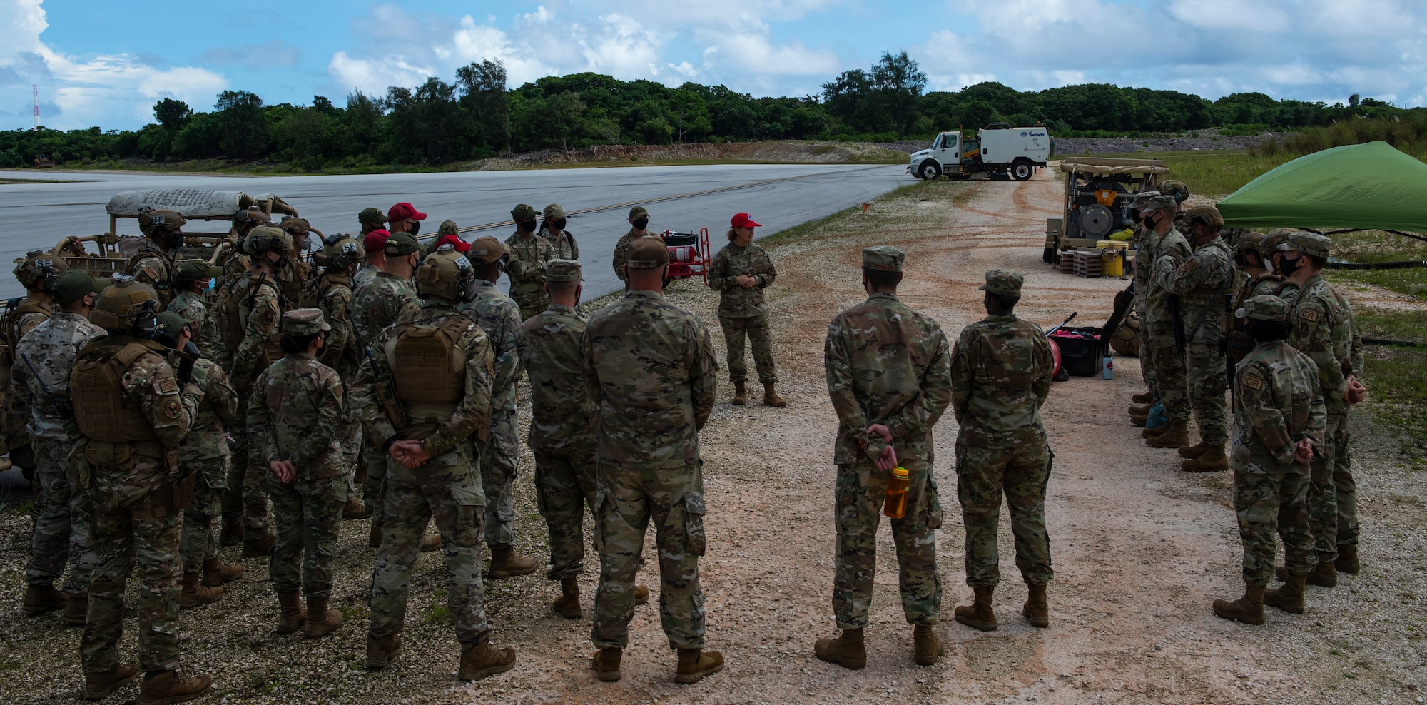 Chief Master Sgt. of the Air Force JoAnne S. Bass talks with Airmen assigned to the 36th Contingency Response Group at North West Field, Guam, Aug. 27, 2021. Bass shared her vision of what the Air Force will look like in the coming years, and heard 36th Wing Airmen’s thoughts about the future force in the Indo-Pacific. Bass received briefs on Andersen AFB’s unique mission sets that contribute to a free and open Indo-Pacific.