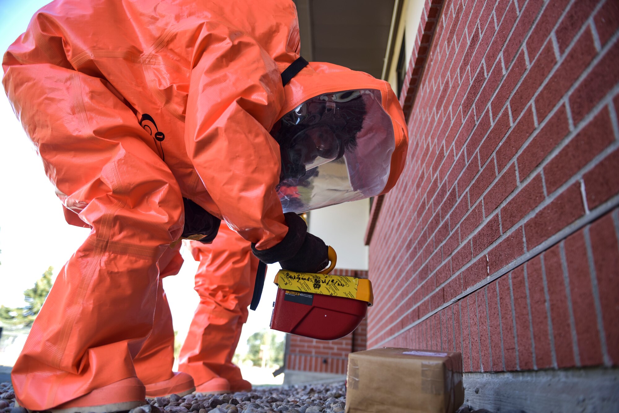 U.S. Air Force Airman 1st Class Dalusong Nino, 92nd Operational Medical Readiness Squadron bioenvironmental engineer, scans a package for radiation during Exercise Ready Eagle at Fairchild Air Force Base, Washington, Aug. 27, 2021.