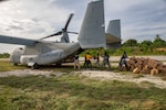 U.S. Marines deliver cases of food using an MV-22B Osprey in support of Joint Task Force-Haiti for a humanitarian assistance and disaster relief mission near Port-au-Prince, Haiti, Aug. 27, 2021.