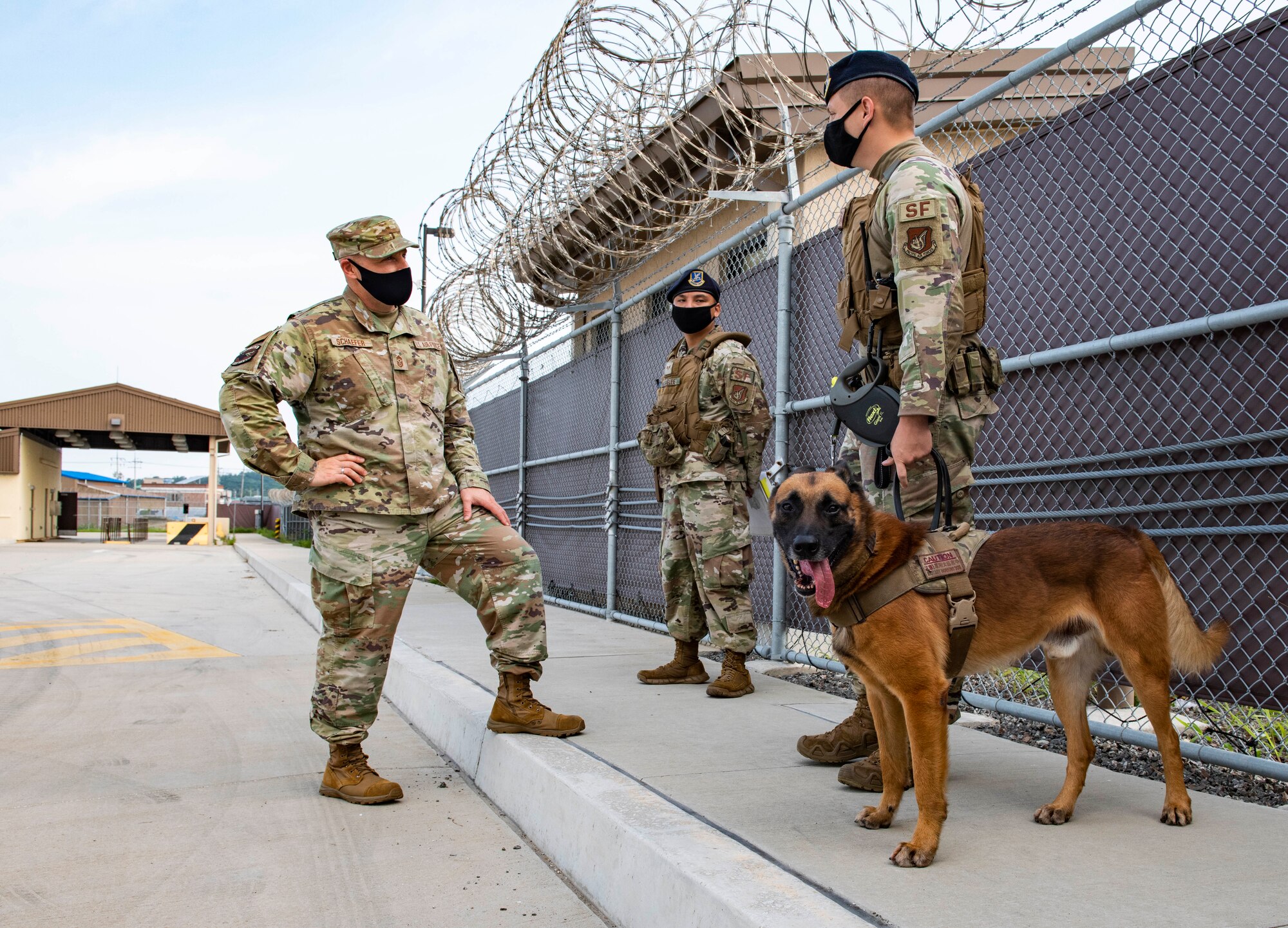 A chief speaks with his Airmen.