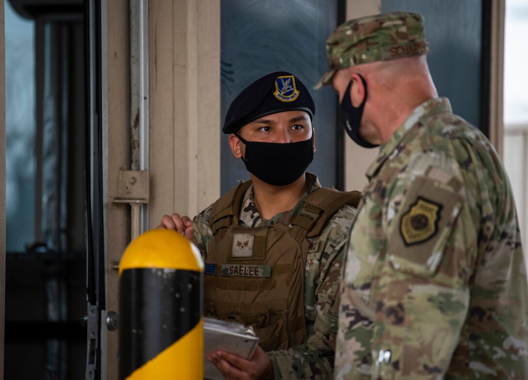 An Airmen talks to their chief.