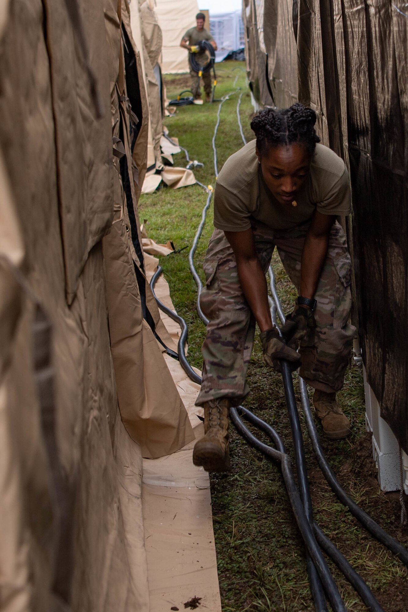 Airman installs electricity.