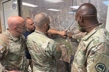 Members of the Louisiana National Guard coordinate Hurricane Ida response.