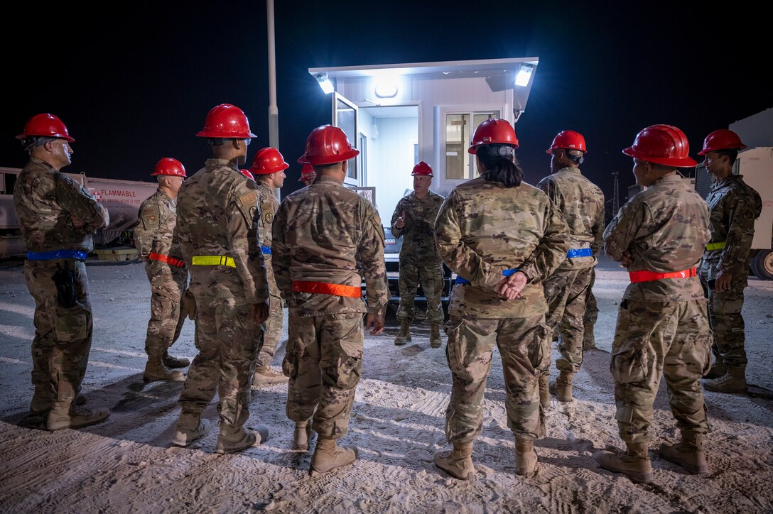 Brig. Gen. Gerald Donohue, 379th Air Expeditionary Wing commander, speaks to members of the 1st Expeditionary Civil Engineering Group Aug. 29, 2021, at Al Udeid Air Base, Qatar.