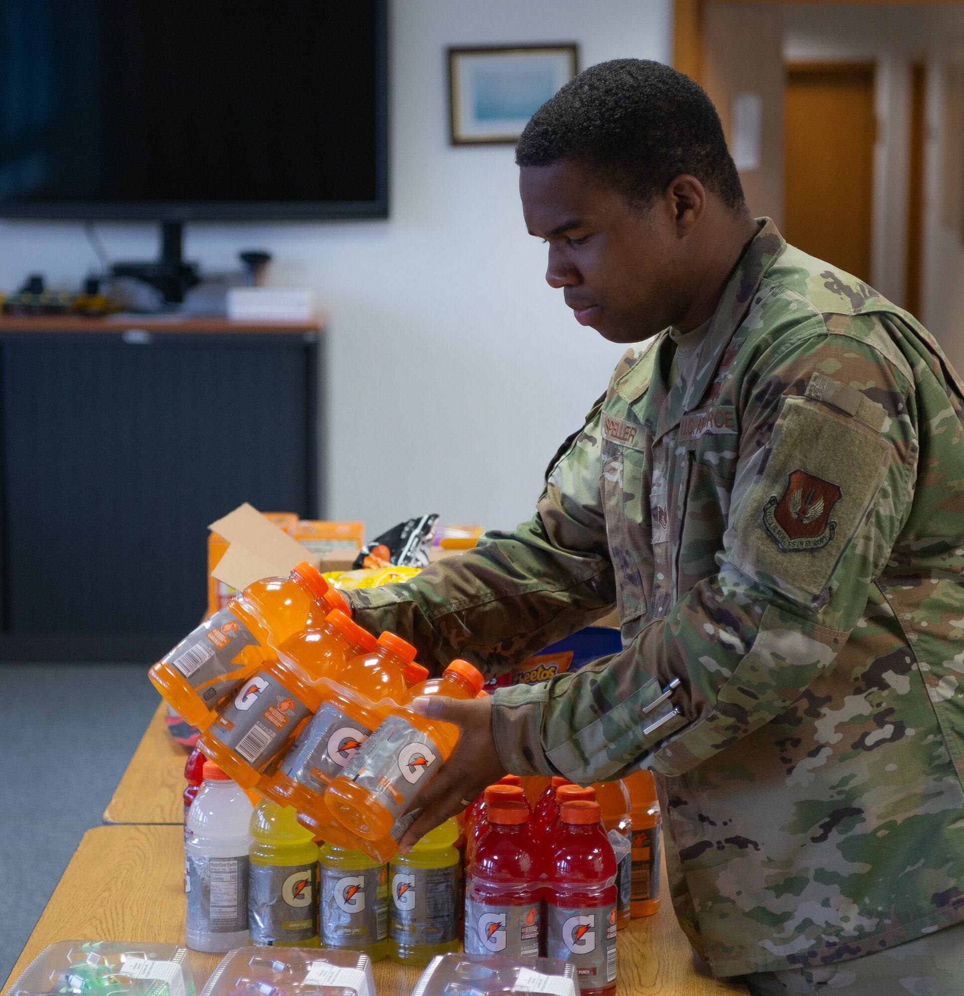 Airman sets down gatorade.