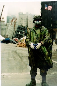 A New York Army National Guard Soldier mans a checkpoint at the World Trade Center in New York City Sept. 14, 2001 following the 9/11 attacks that brought down the Trade Center's Twin Towers. New York National Guard Soldiers and Airmen played a key role in the state response to the attack. More than 14,000 members of the New York Army and Air National Guard, the New York Naval Militia and the New York Guard were on duty at some points in the months after the attack.