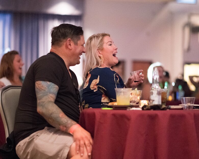 Audience members enjoy a stand-up comedy show at The Landings on Dover Air Force Base, Delaware, Aug. 27, 2021. The show featured comedians Dennis Gaxiola and Preacher Lawson. (U.S. Air Force photo by Mauricio Campino)