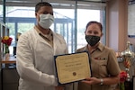 Leadership at Naval Health Cherry Point recognized two staff members Friday, August 27 for their excellent performance and contributions to patient safety while serving aboard Marine Corps Air Station Cherry Point.

Hospitalman Kiya F. Smith a member of the clinic’s Laboratory Staff was presented a certificate and coin from Navy Capt. Elizabeth Adriano, the clinic’s commander.