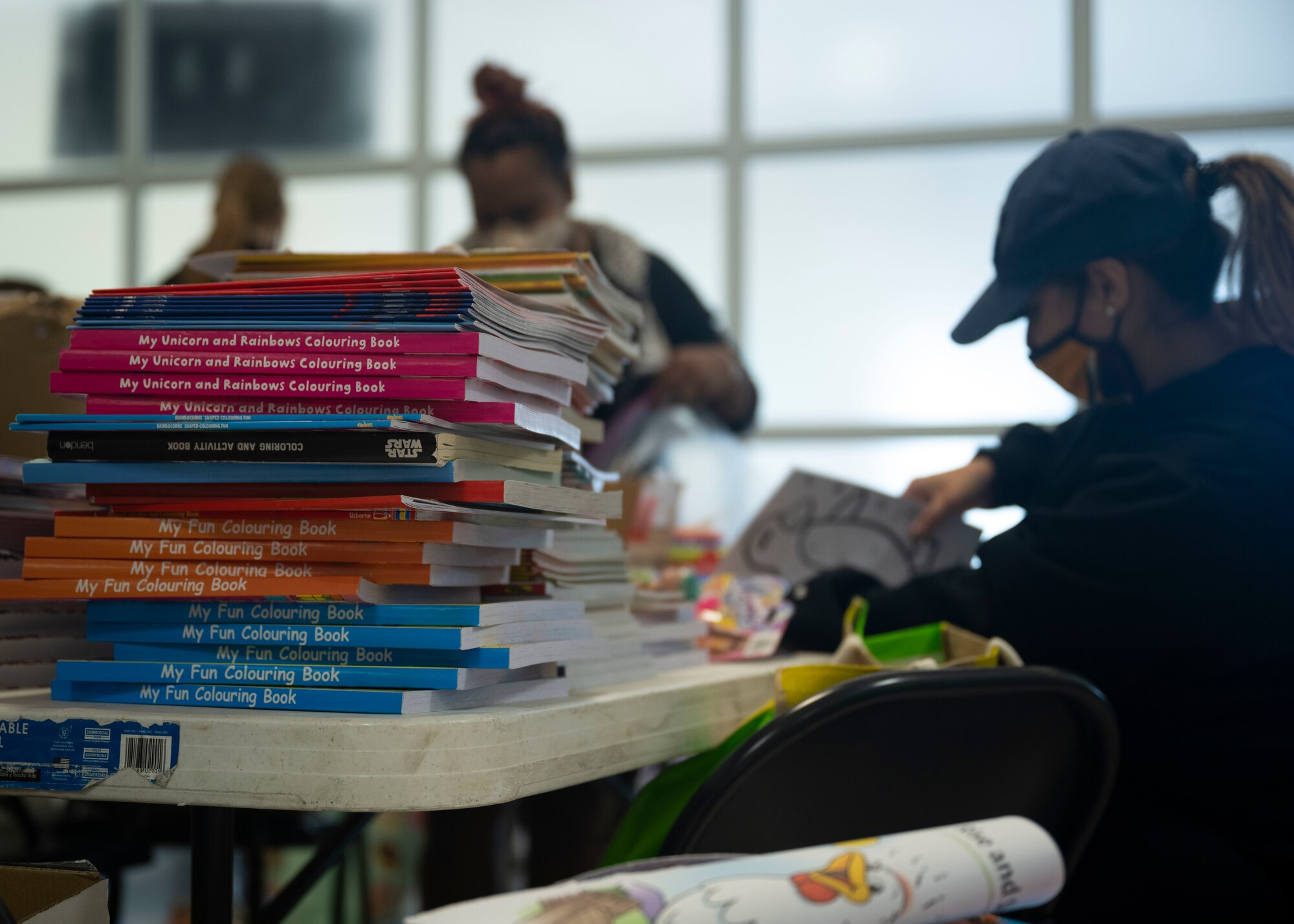 U.S. Airmen, civilians and military spouses from Team Mildenhall and Liberty Wing volunteer in support of Operation Allies Refuge at Royal Air Force Mildenhall, England, Aug. 26, 2021.
