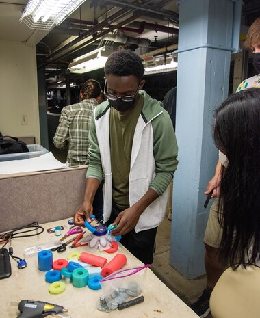 SEAP Intern Darwin Otchere assembling materials for a SeaJelly launch.