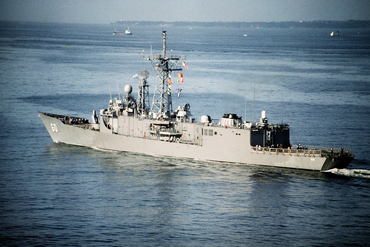 A large ship sails through the ocean.