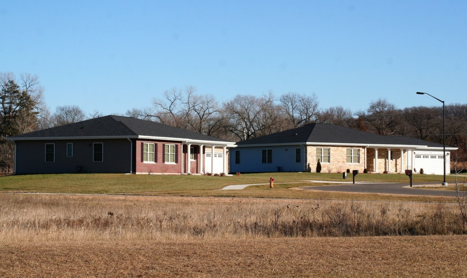 A home is shown Dec. 4, 2020, at the South Post Family Housing area at Fort McCoy, Wis. Twenty-two homes are officer homes (nine three-bedroom and 13 four-bedroom), and 91 are enlisted homes (55 three-bedroom and 36 four-bedroom). The area doubled in size in 2017 after the completion of 57 new homes. Another seven homes are nearly complete in the area. The housing area is managed by the Fort McCoy Directorate of Public Works Housing Division. (U.S. Army Photo by Scott T. Sturkol, Public Affairs Office, Fort McCoy, Wis.)