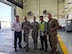 U.S. Air Force Staff Sgt. Angela Martinez, the 354th Civil Engineering Squadron (CES) noncommissioned in charge of material control, members from the Korean Airline and Airmen assigned to the 354th CES pose for a group photo on Gimhae Air Base, South Korea, April 2019.