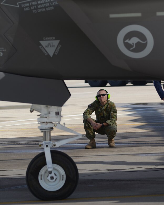 Australian officer watches procedures for launching an F-35.