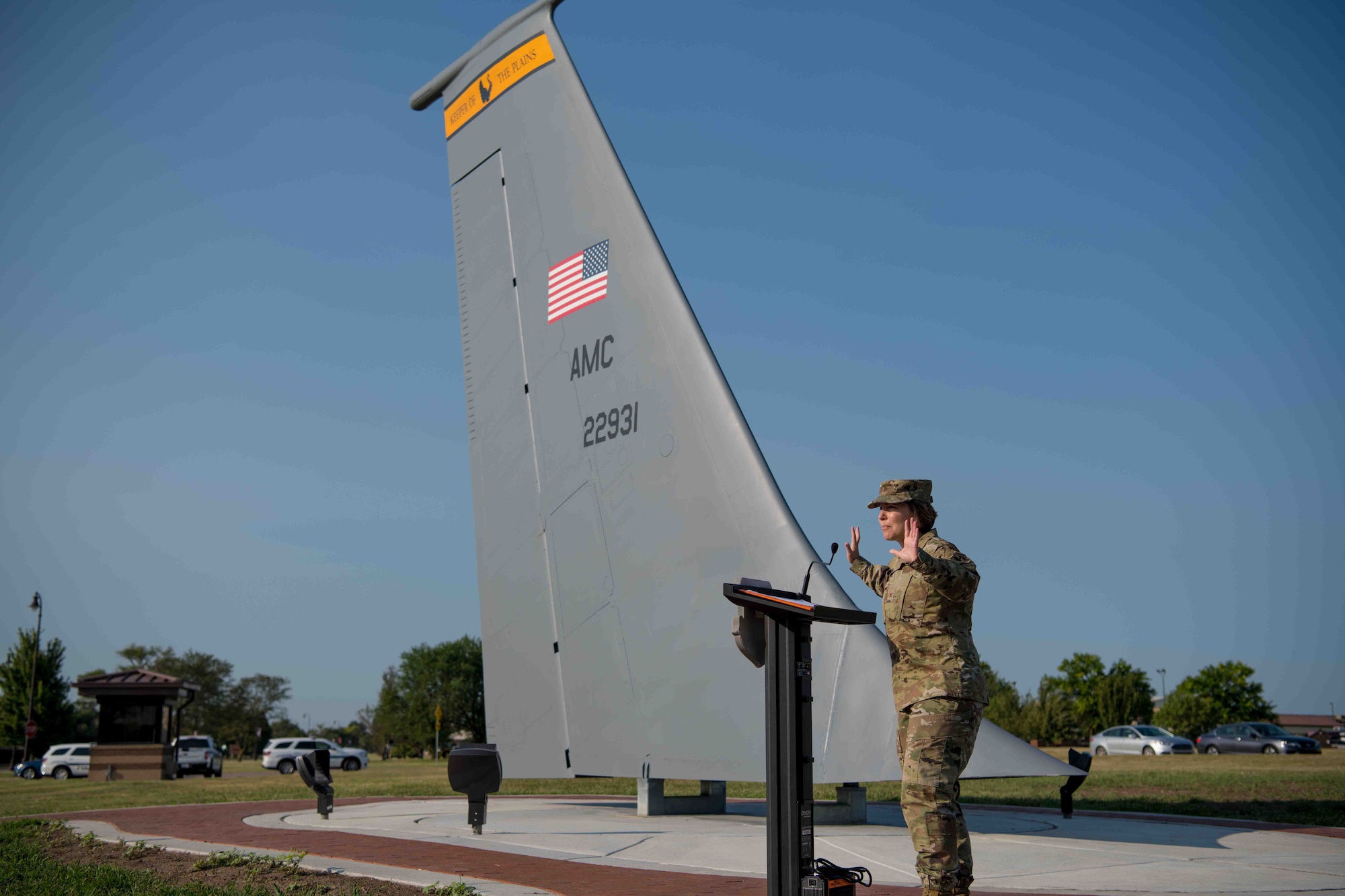 Col. Emily Farkas, 22nd Maintenance Group commander, offers opening remarks during the tail flash ceremony Aug. 31, 2021, at McConnell Air Force Base, Kansas. Farkas acknowledged efforts from the 22nd and 931st MXGs and the 22nd Civil Engineer Squadron for their skill and expertise in putting the tail flash together for McConnell AFB. The new tail number is a display of the ongoing relationship between the 22nd and 931st Air Refueling Wings. (U.S. Air Force photo by Senior Airman Marc A. Garcia)